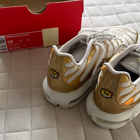 Nike Women’s Air Max Plus White and Gold Sneakers